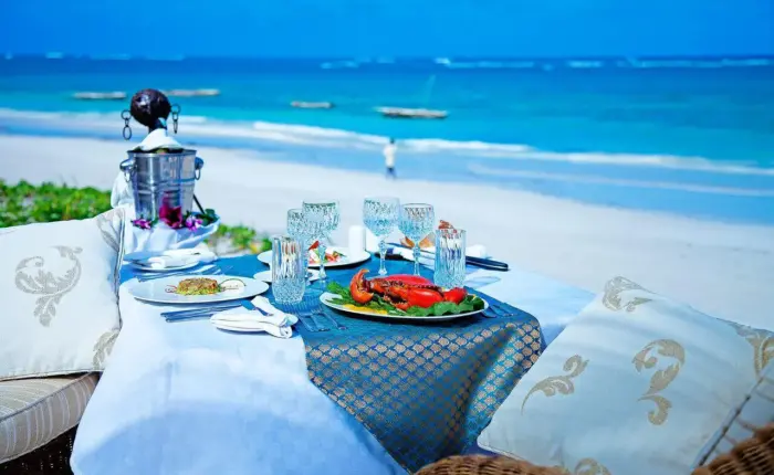 Beachfront lunch setup at AfroChic Diani Beach during a Kenya safari trip extension